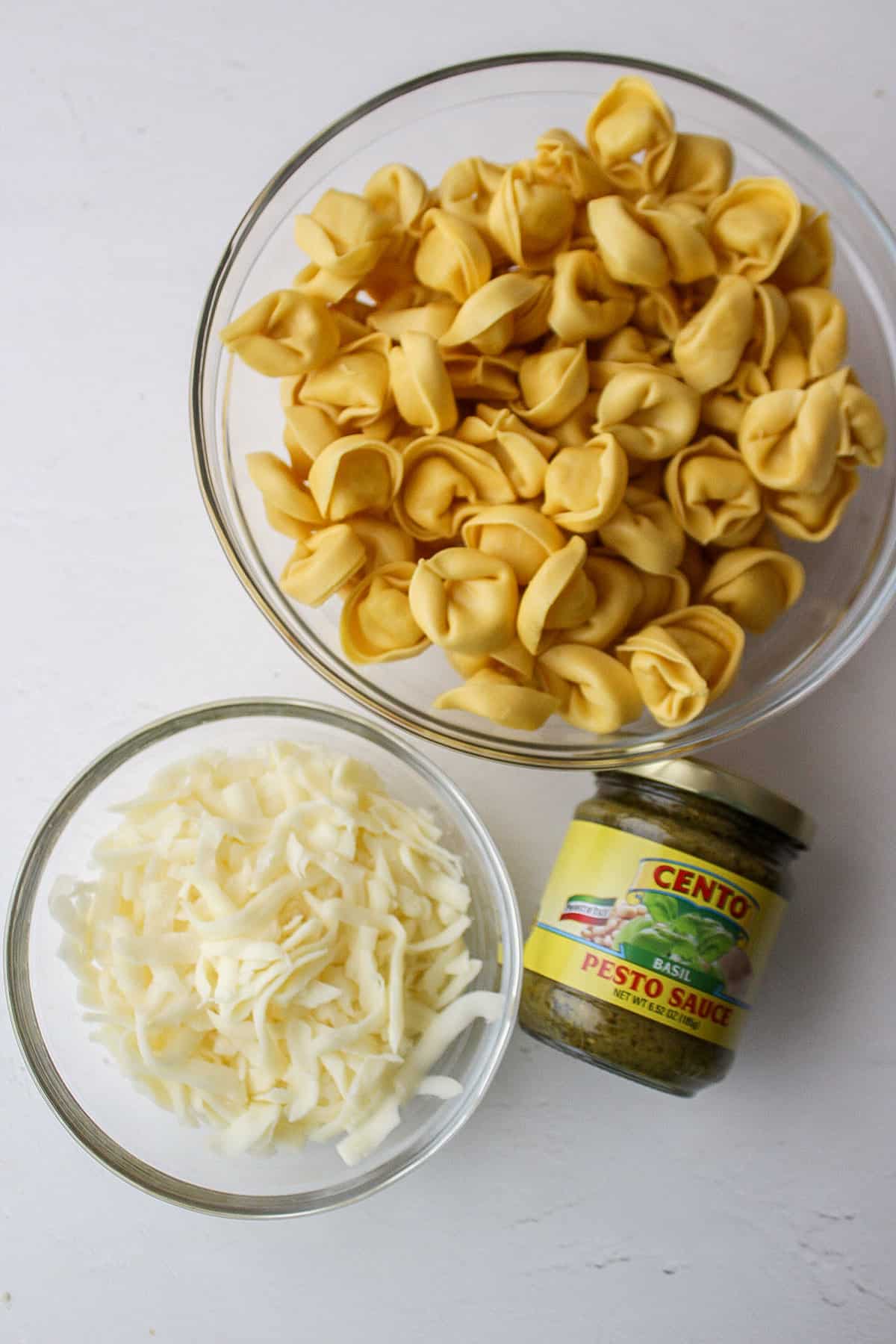 ingredients for cheesy pesto tortellini bake