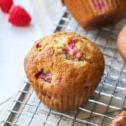 lemon raspberry muffin on a cooling rack