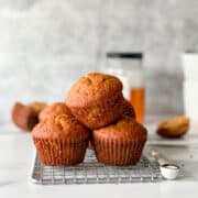 a small stack of three muffins up close