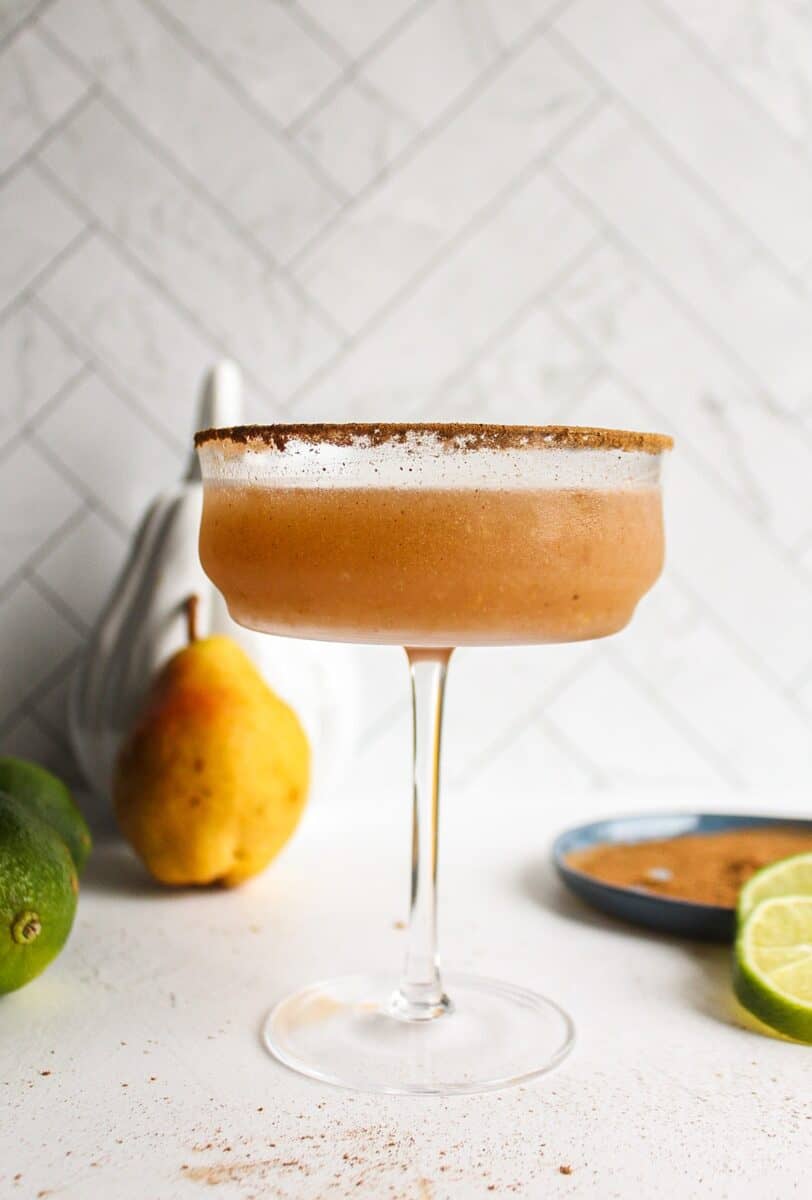 a glass of a spiced pear margarita