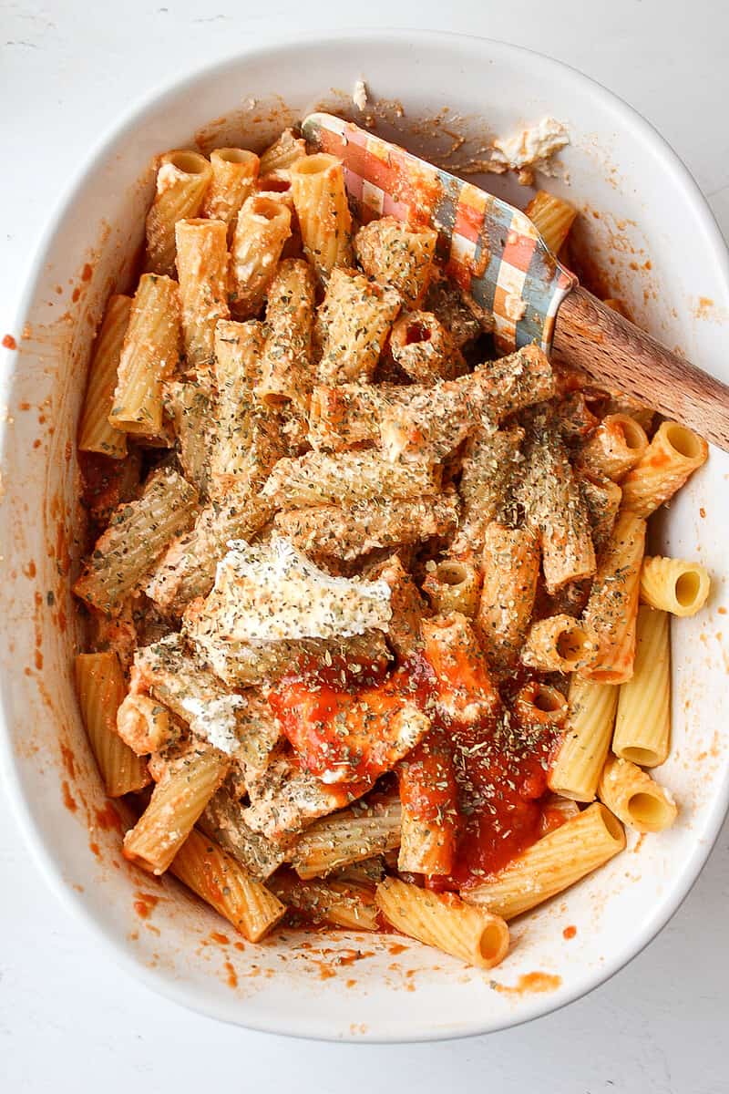 pasta mixed with dried spices and marinara sauce