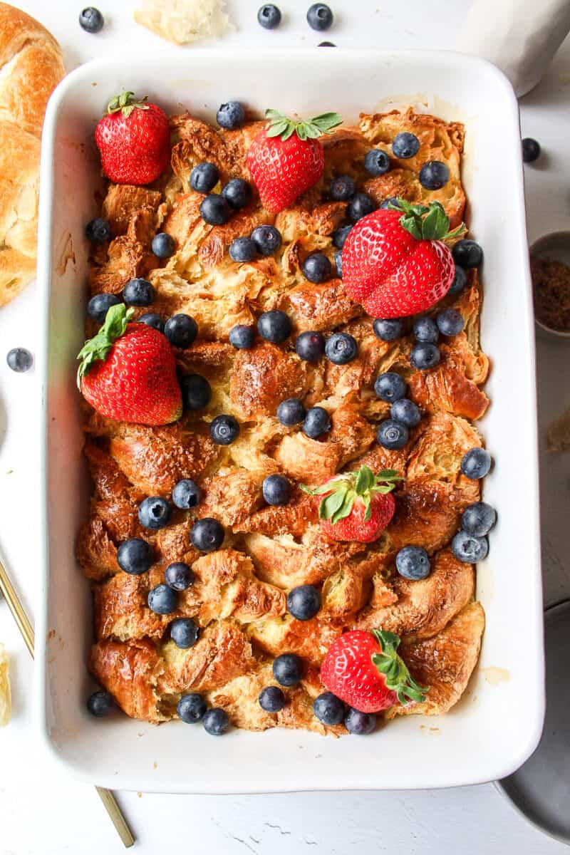 croissant french toast bake with berries on top.