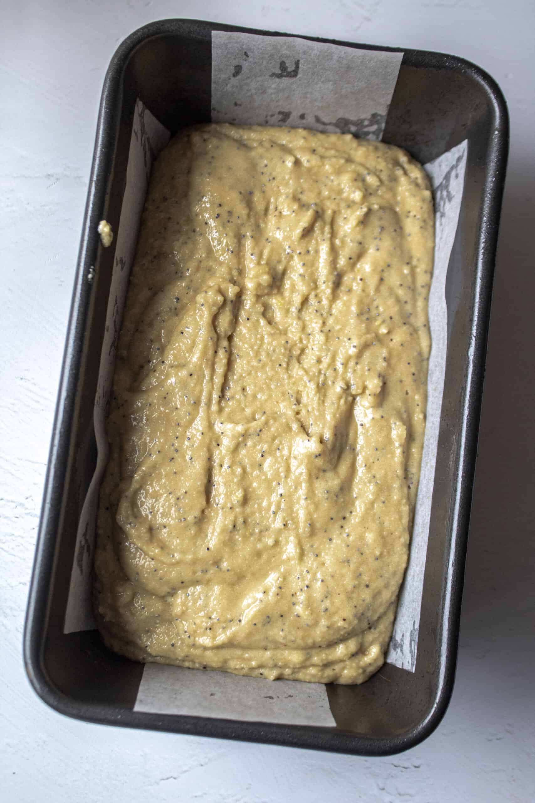 lemon poppy seed batter in a loaf pan