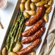 sausage, vegetables, and potatoes on a platter