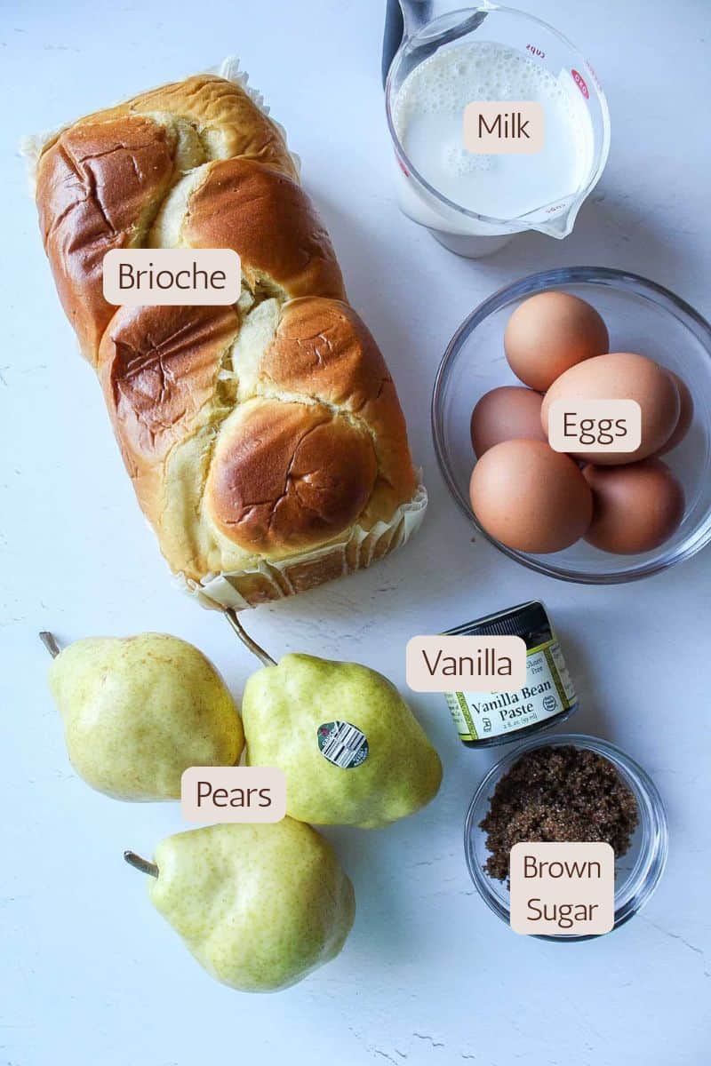 Ingredients to make a pear french toast bake topped with brown sugar.