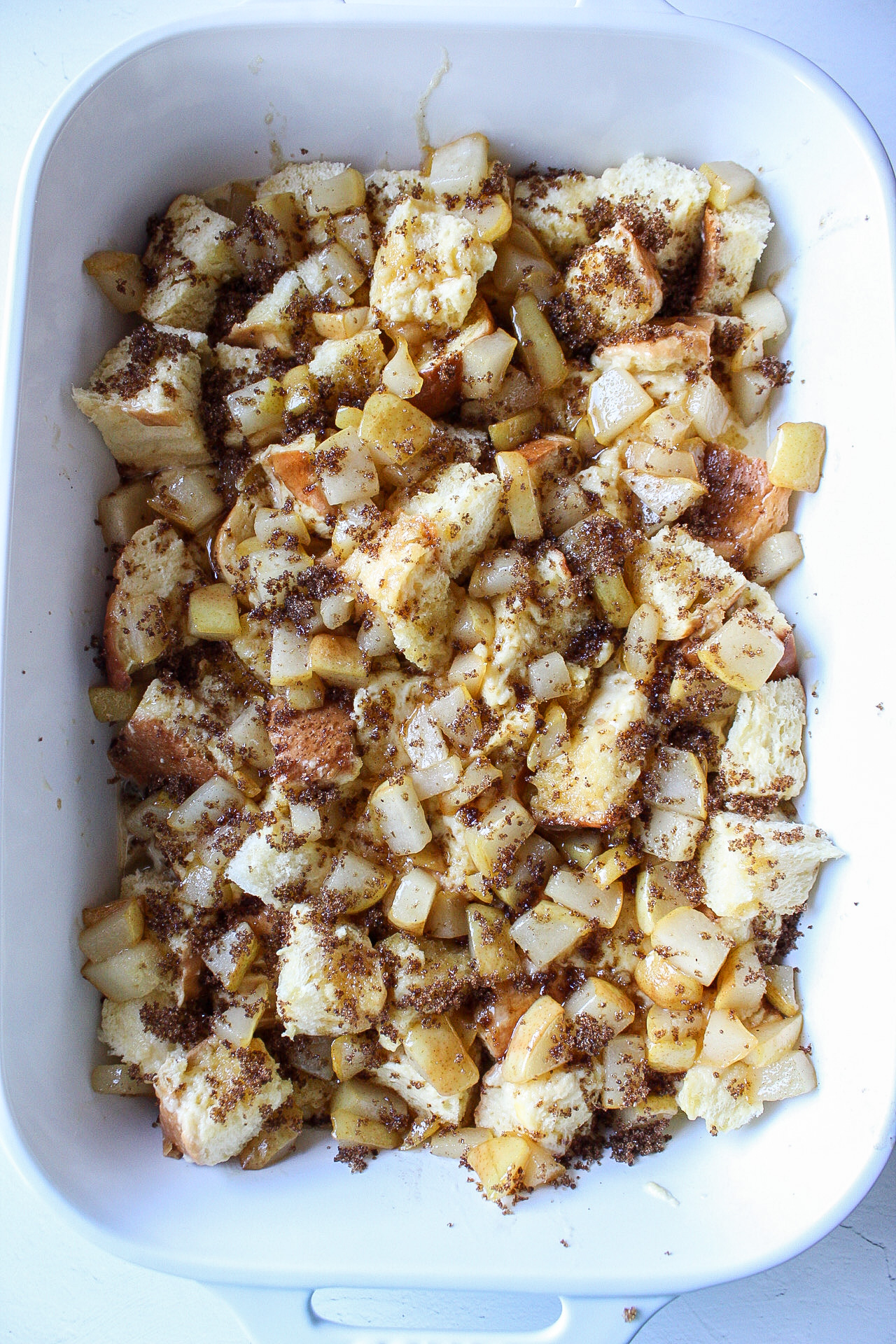 french toast bake with pear and brown sugar in a casserole dish