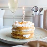 3 waffles with a a candle in it