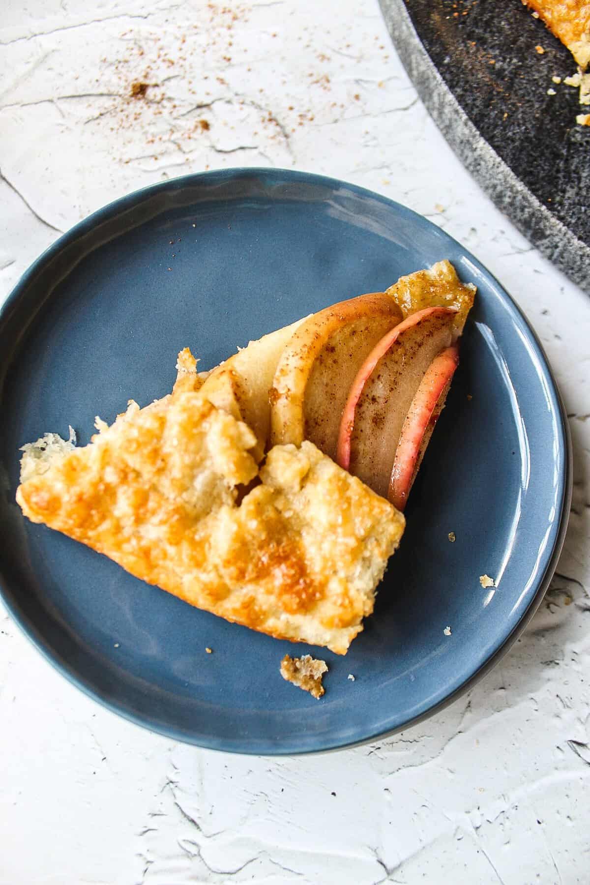 a slice of an apple galette on a plate