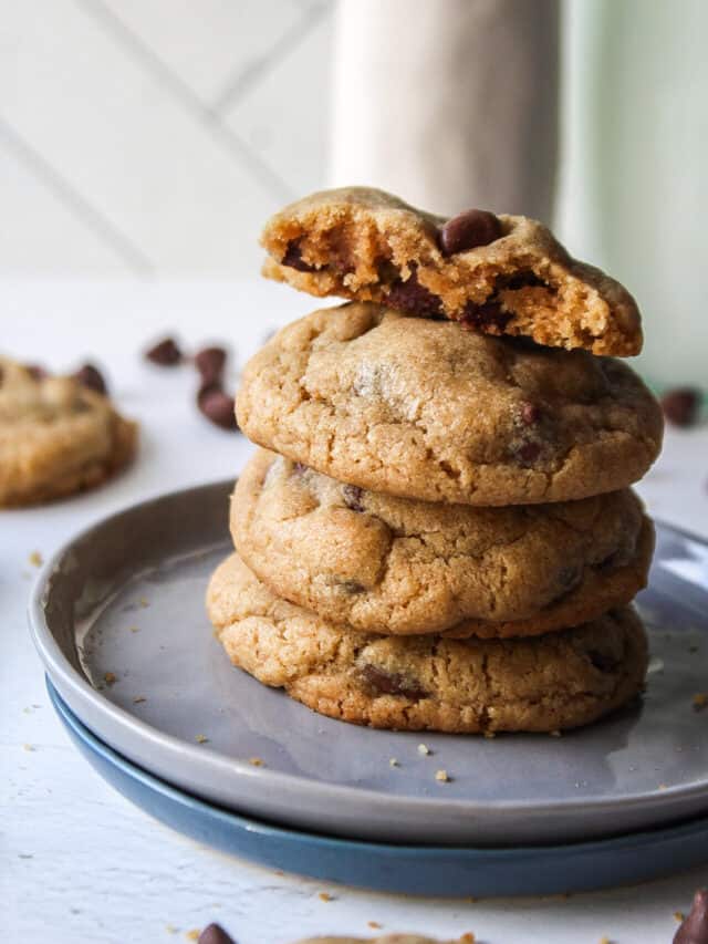 brown butter chocolate chip cookies stacked on a small plate