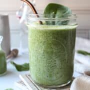a glass of green smoothie