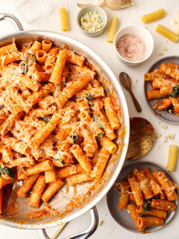 pasta in a pan with sauce and cheese