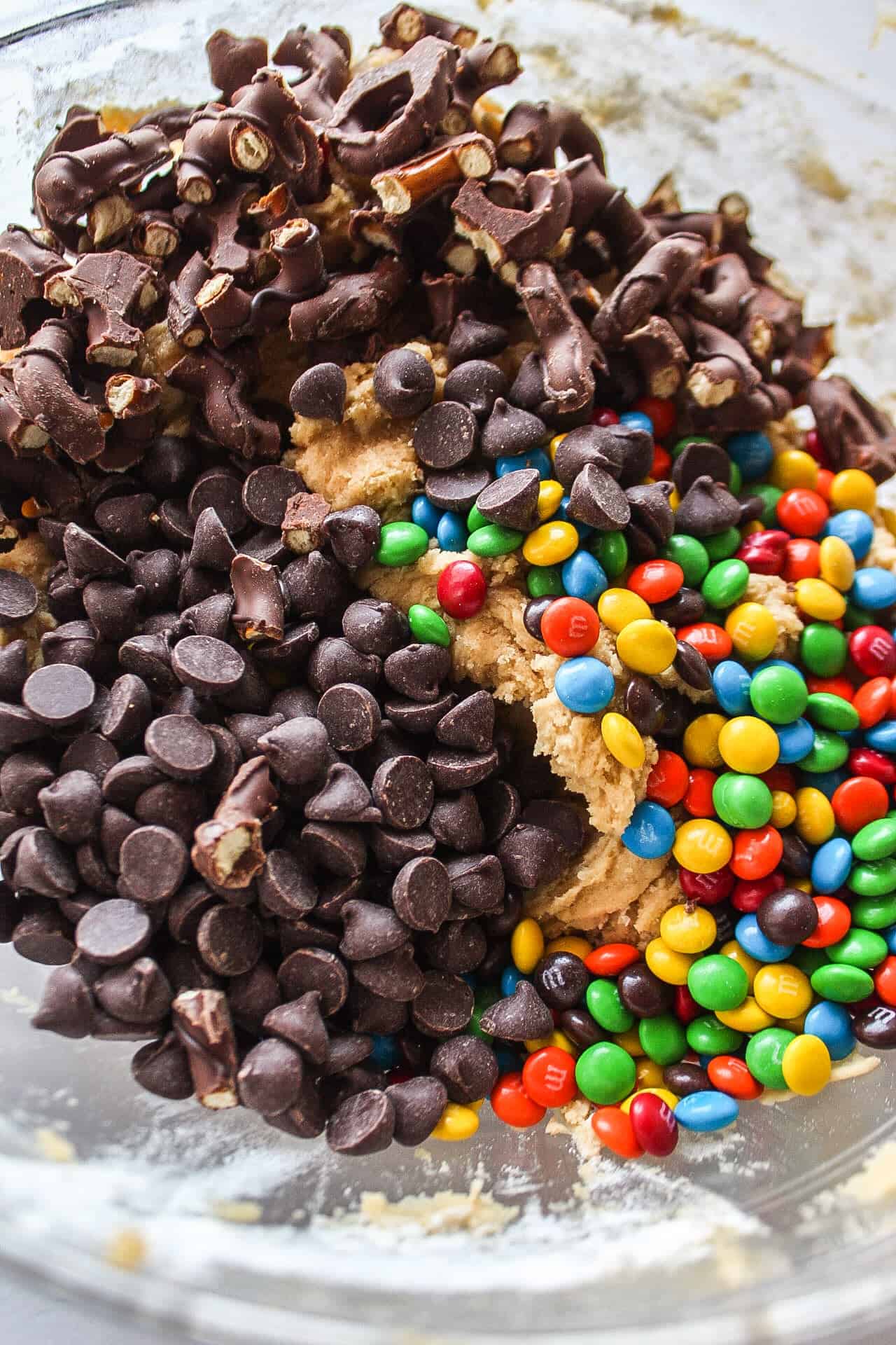 bowl full of cookie dough and add ins
