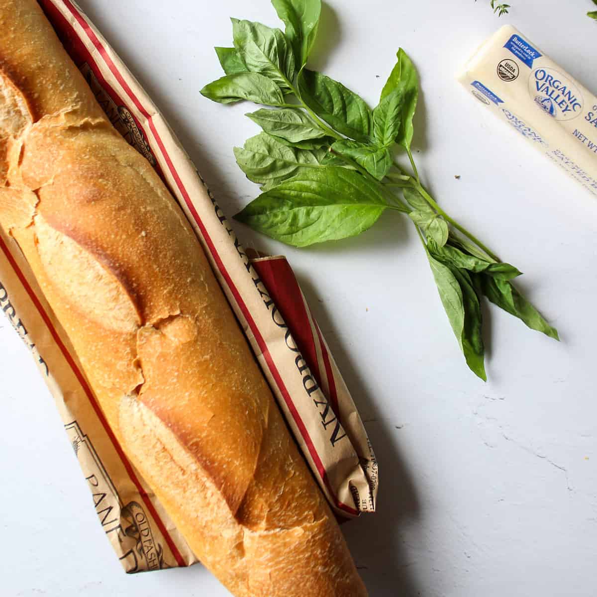 ingredients to make garlic bread with herbs