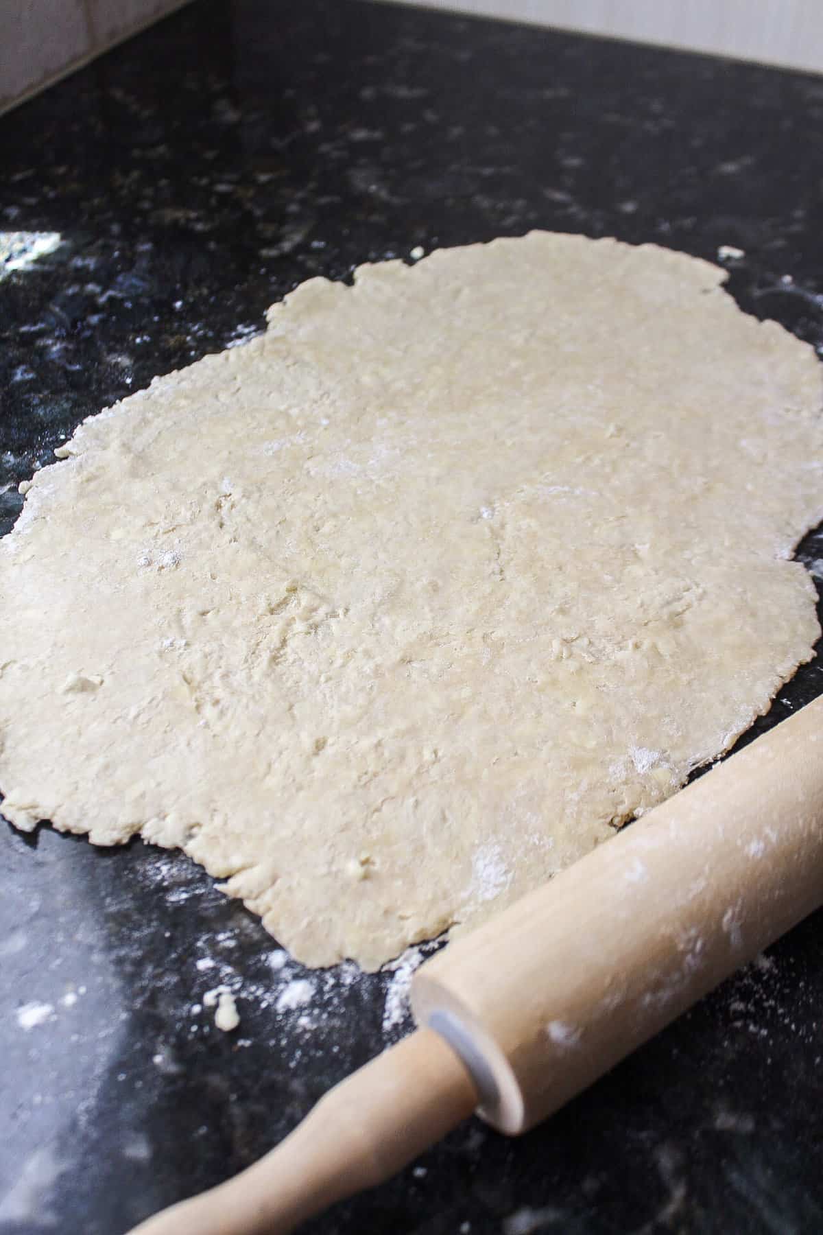 galette dough rolled out on a countertop
