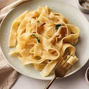 pasta with brown butter and sage on a plate