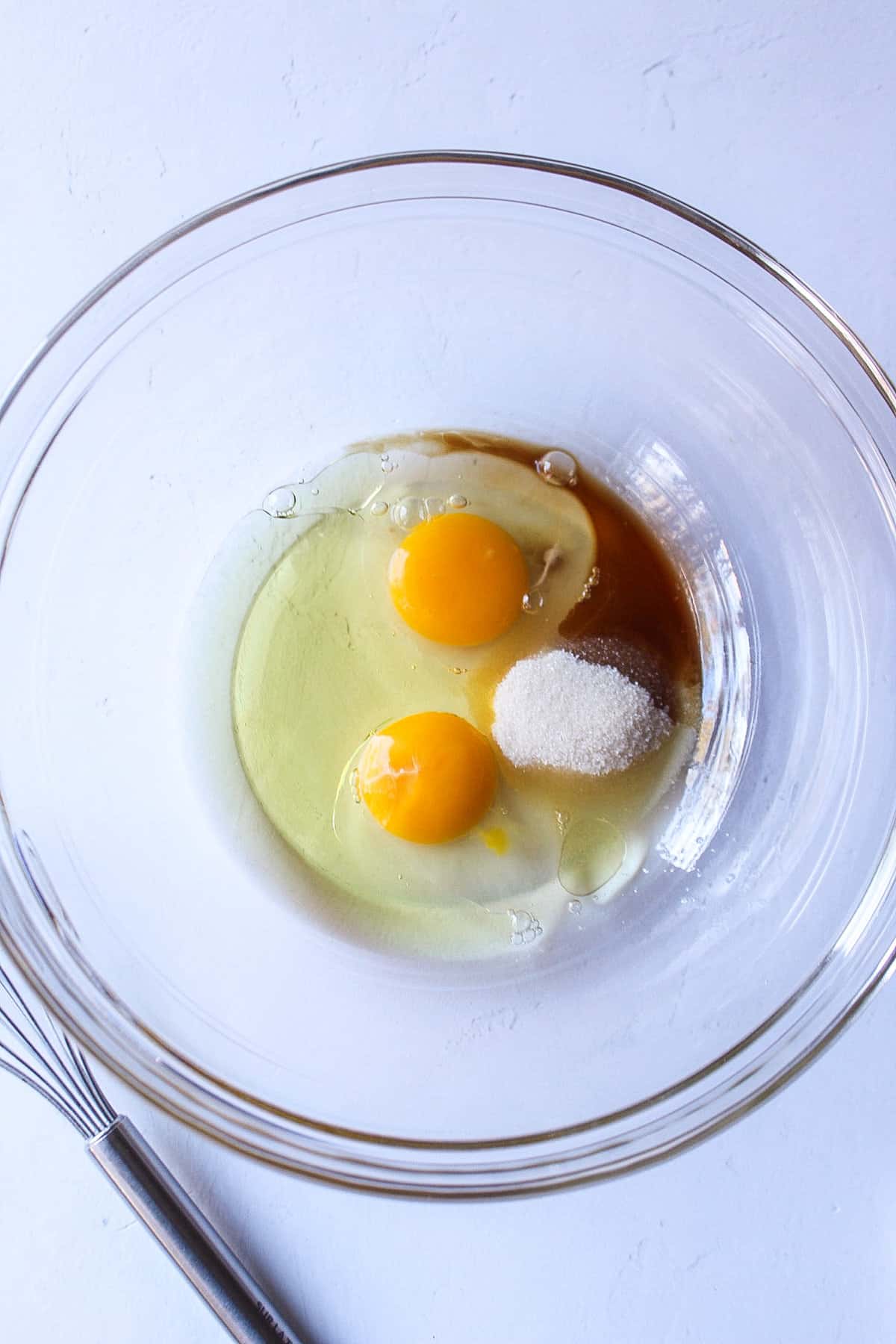 eggs, vanilla, sugar and oil in a large mixing bowl