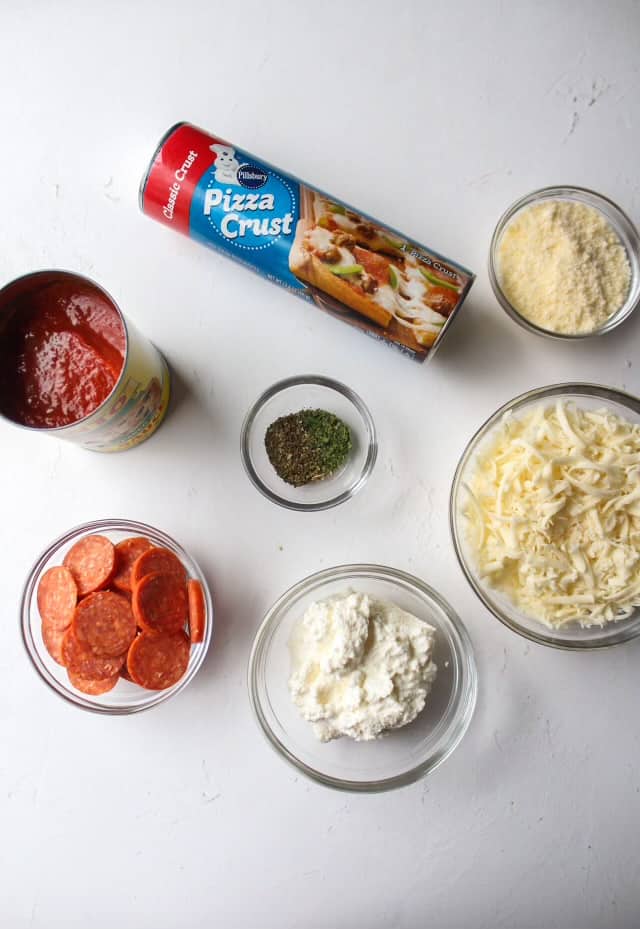 ingredients to make a stuffed pizza braid with pepperoni and three cheeses