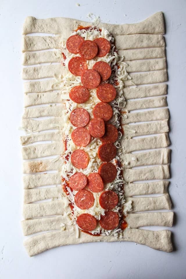 inside of a pizza braid with pepperoni on top.