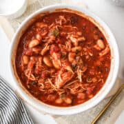 slow cooker white bean chicken chili in a large white bowl.