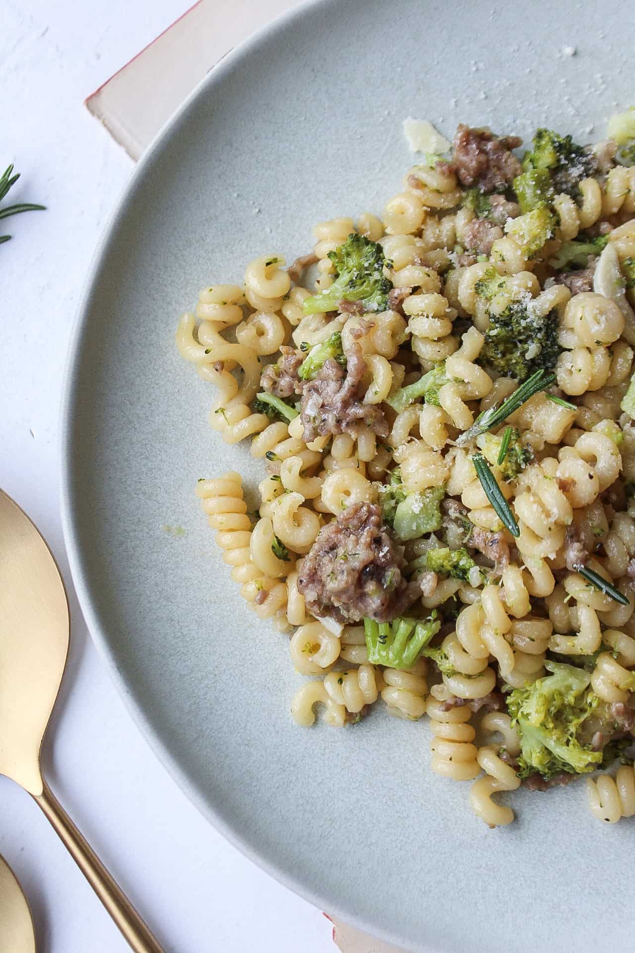 Close up of a plate of one pot sausage broccoli pasta.