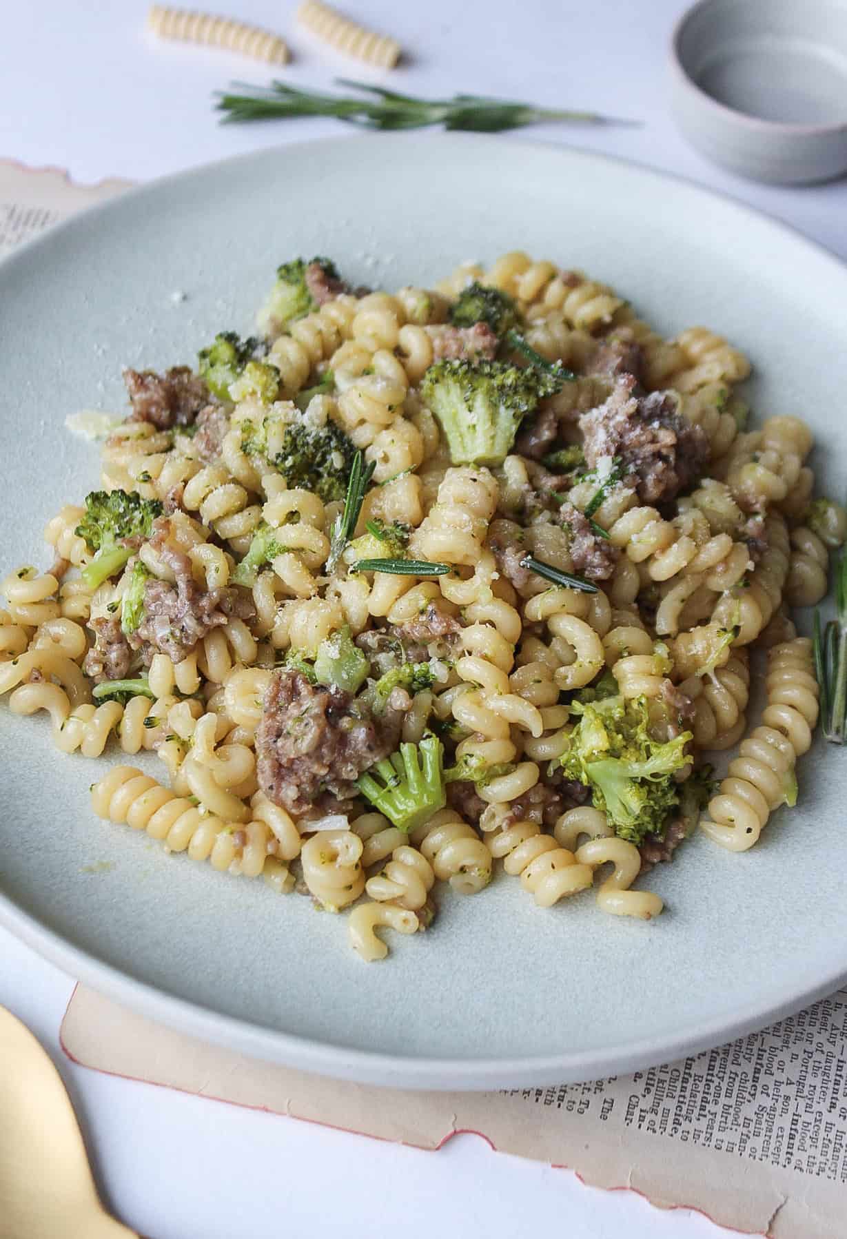 Close up of a plate of one pot sausage broccoli pasta.