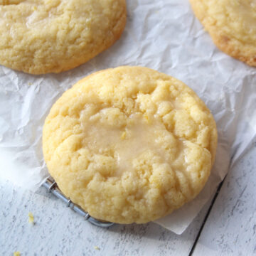 sugar cookie on a cooling rack with parchment paper.