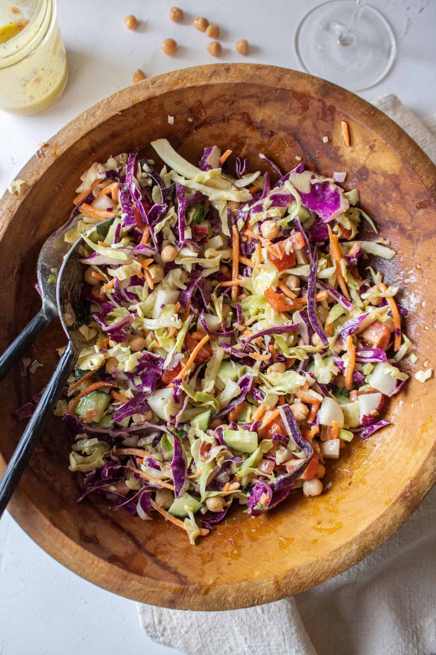 cabbage crunch salad in a large wooden bowl.