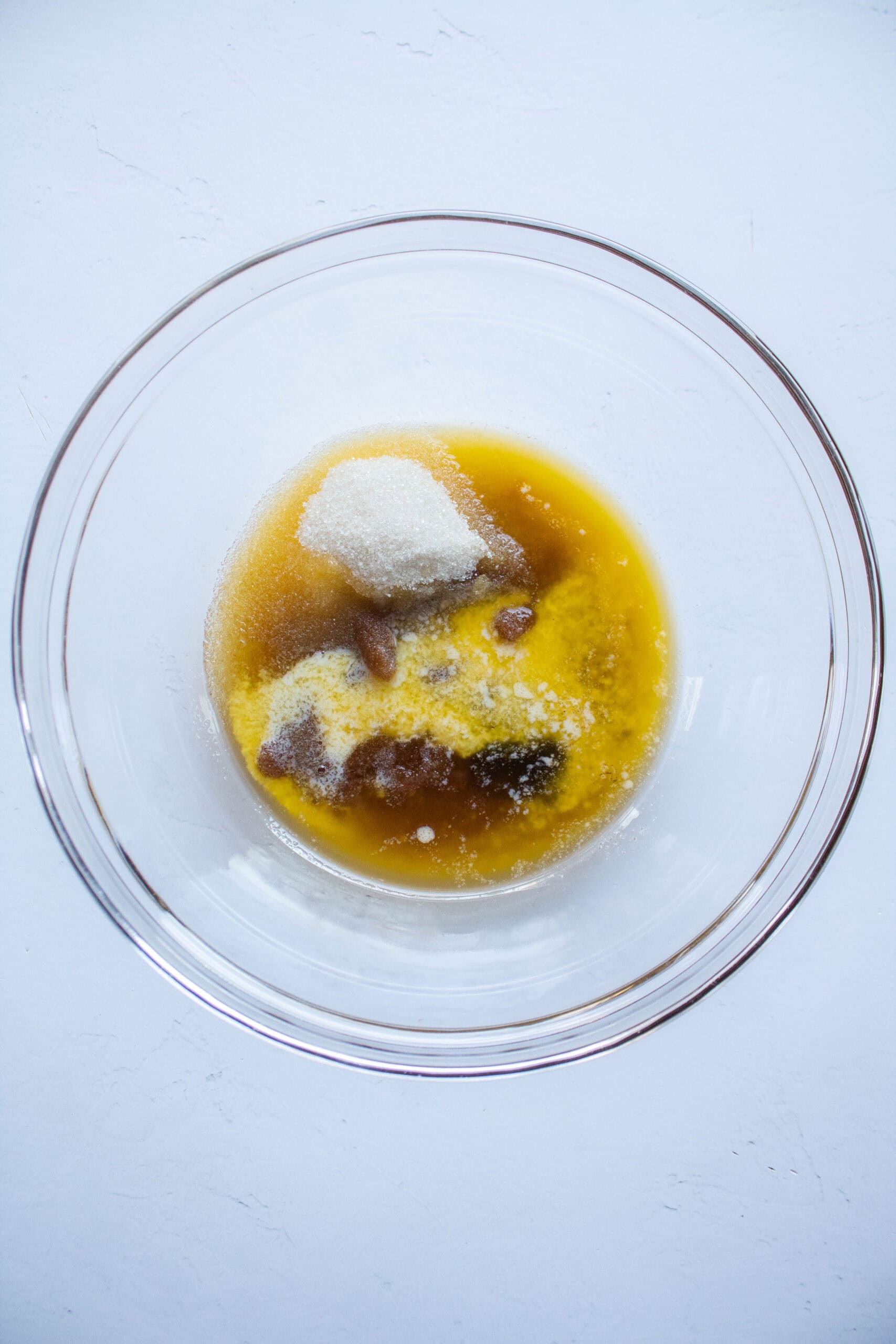 Wet ingredients to make tiramisu cookies in a large bowl.