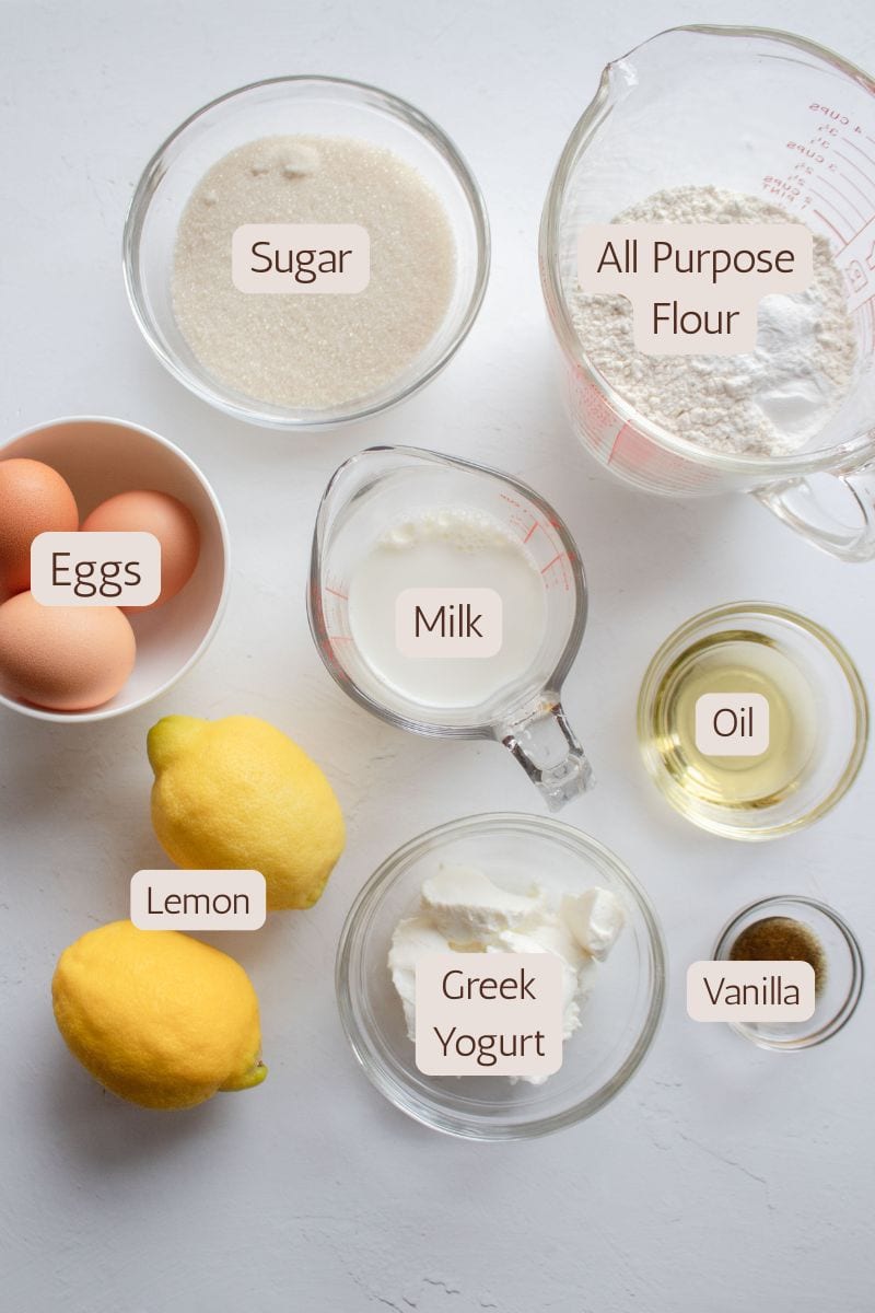 Ingredients to make an iced lemon loaf cake.