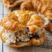 Close up of cranberry chicken salad in a croissant.
