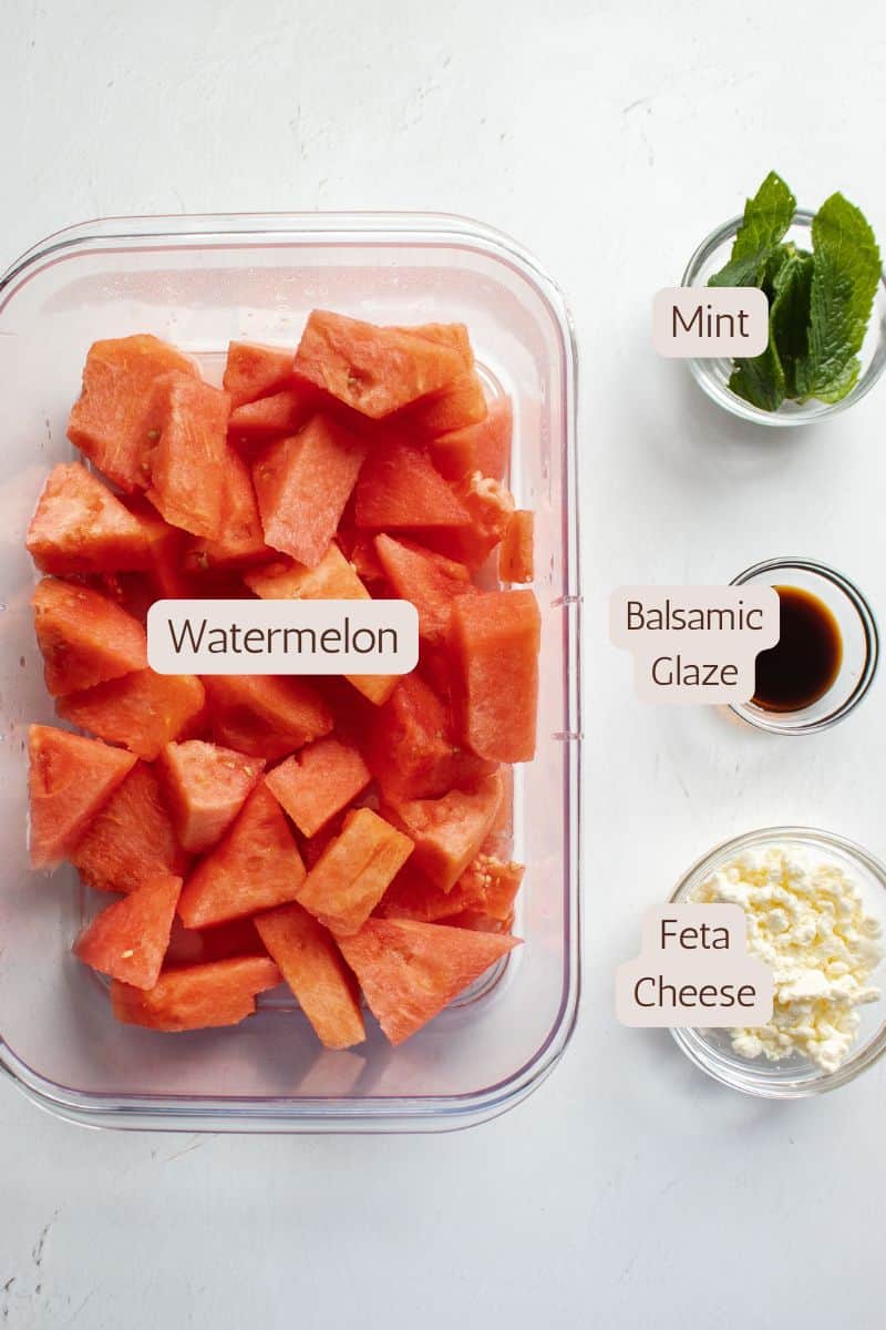 Ingredients for making a watermelon and feta salad with mint and balsamic.