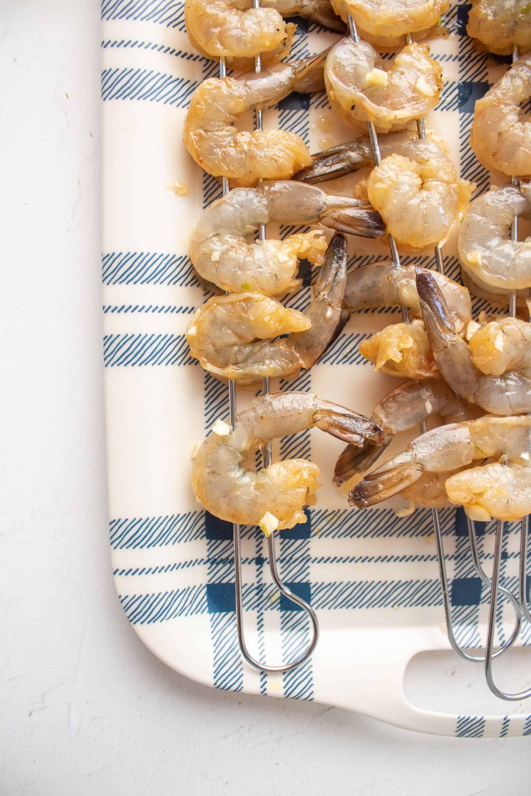 skewered shrimp on a serving platter.