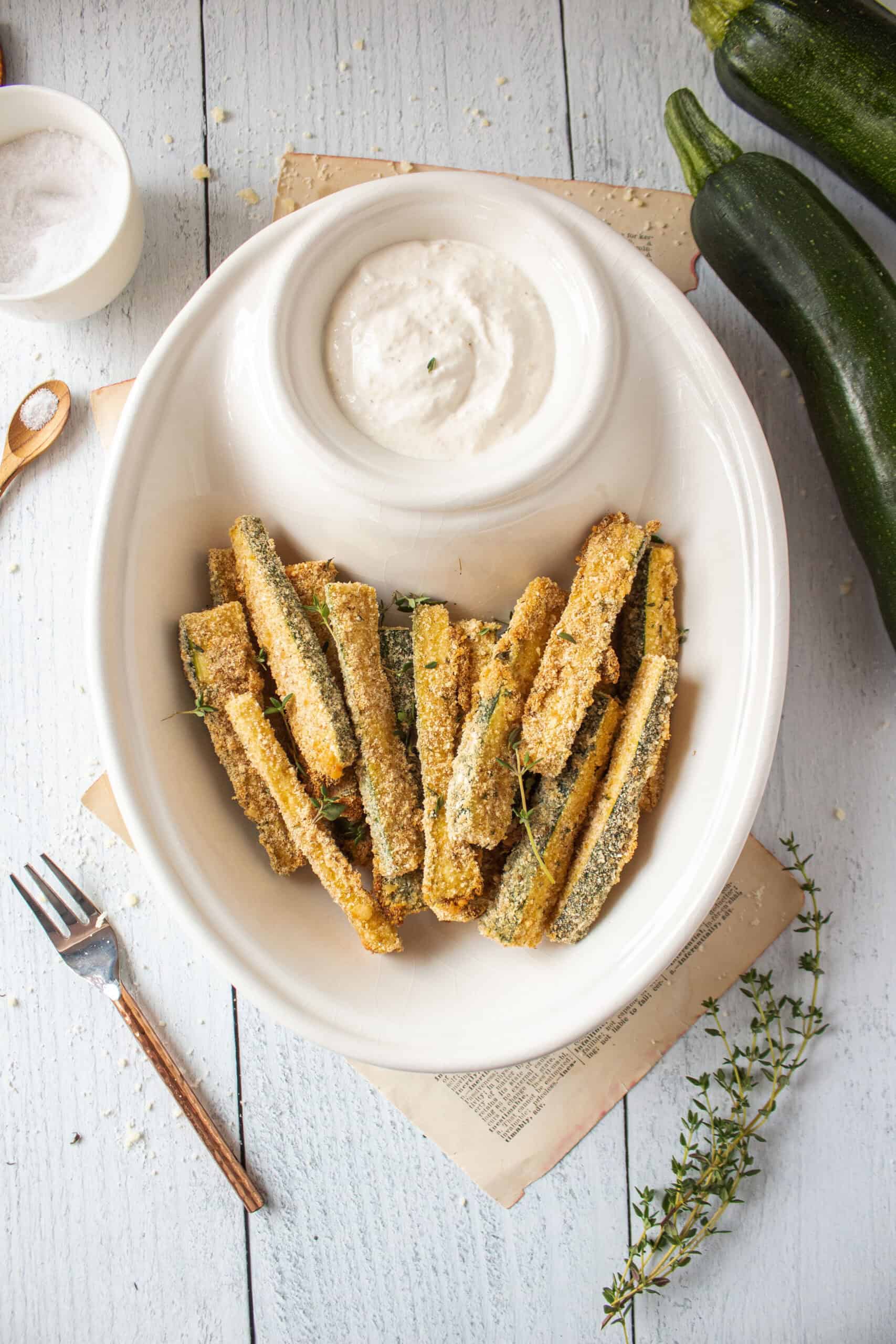 Air fryer zucchini fries in a bowl.