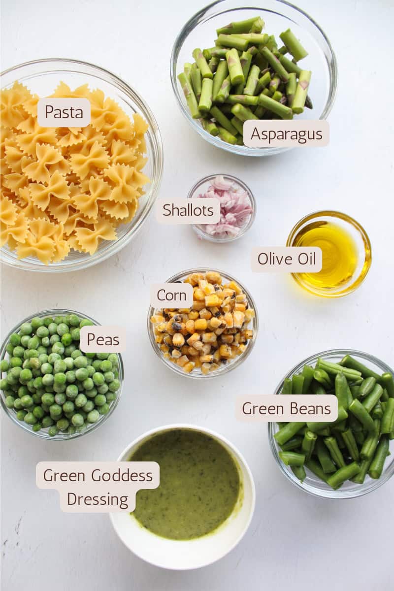 Ingredients needed to make veggie spring pasta salad.