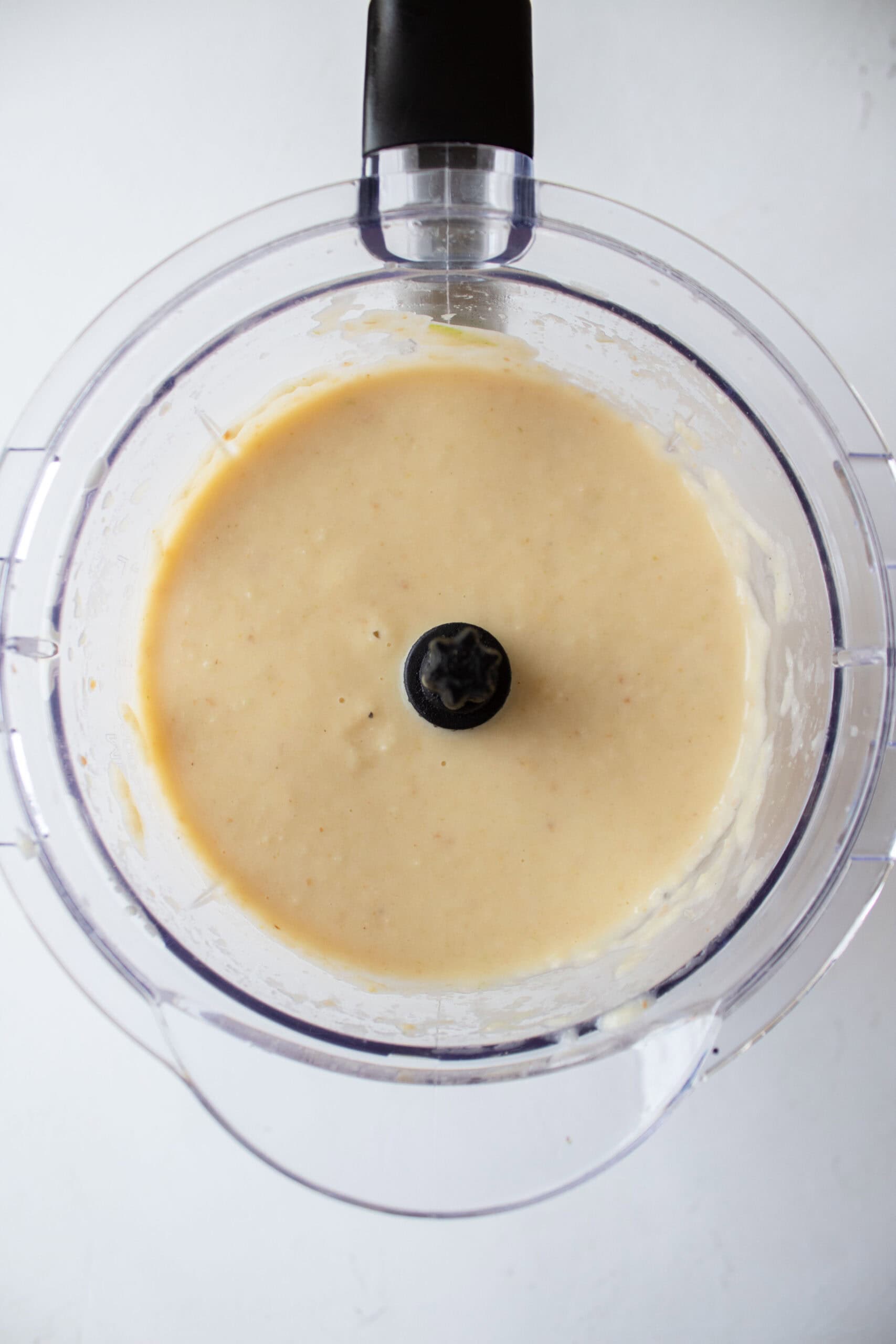 Blended parsnips and pears in a large blender.
