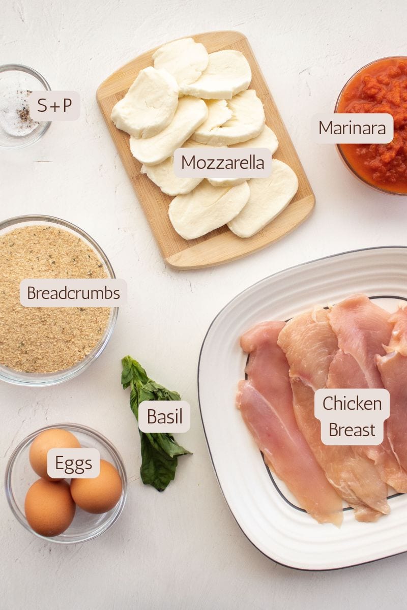 Ingredients to make a skillet chicken parmesan.