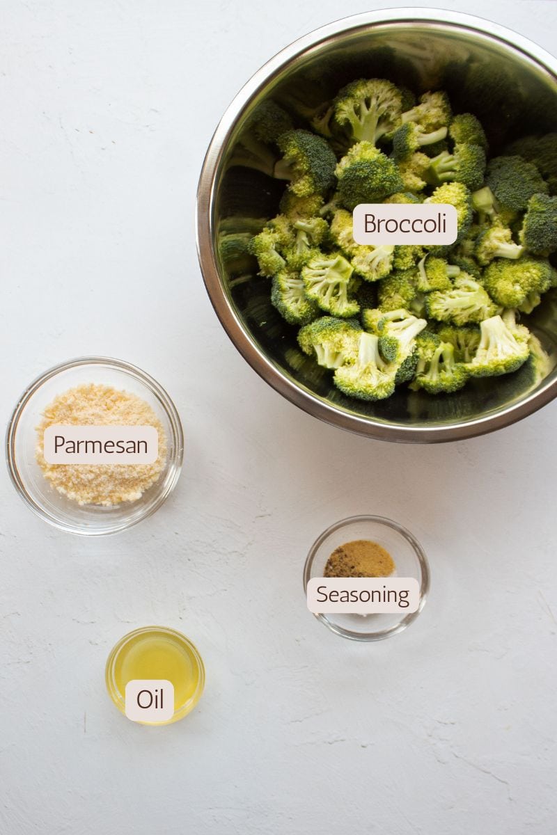 Ingredients to make air fryer broccoli with parmesan.