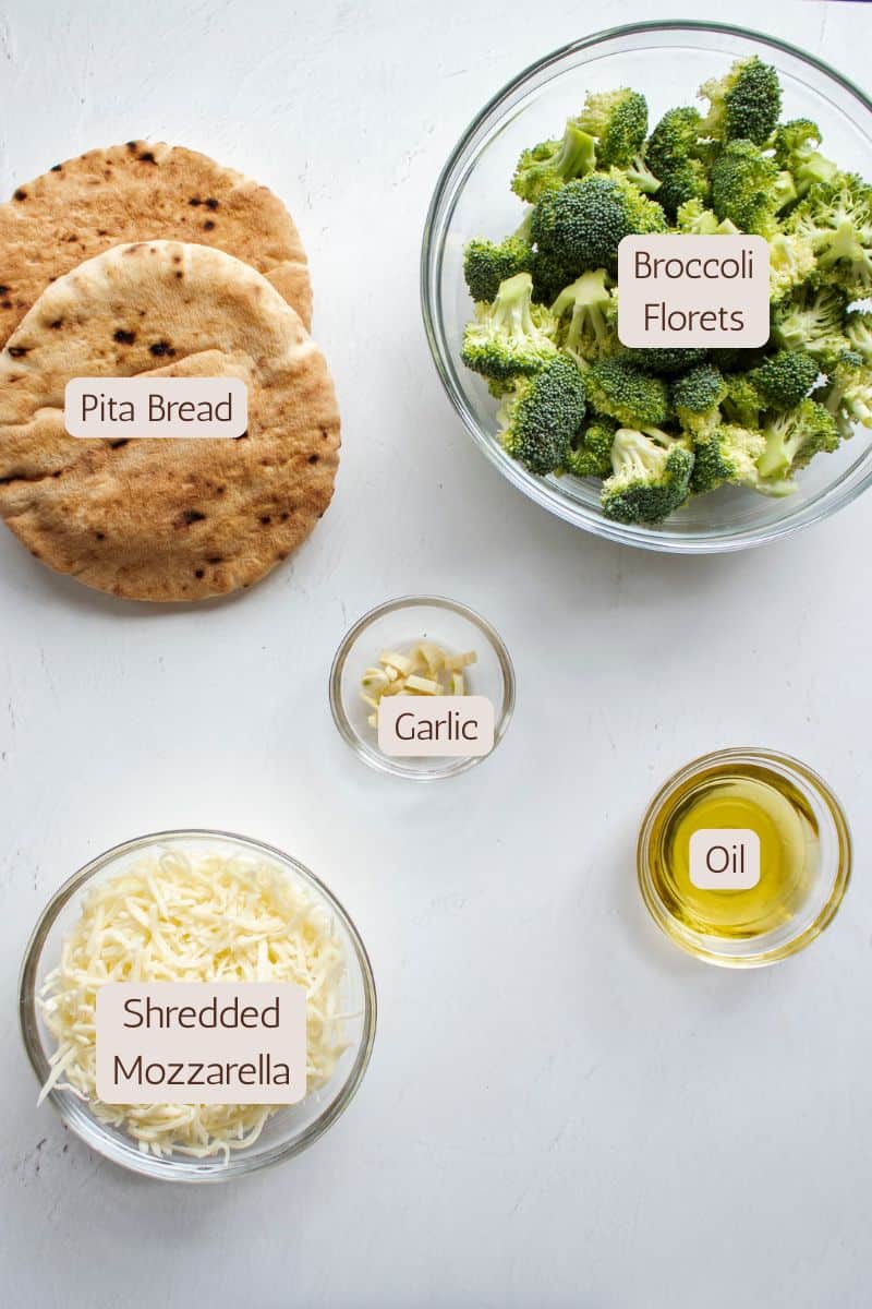 Ingredients to make a broccoli pita melt sandwich.