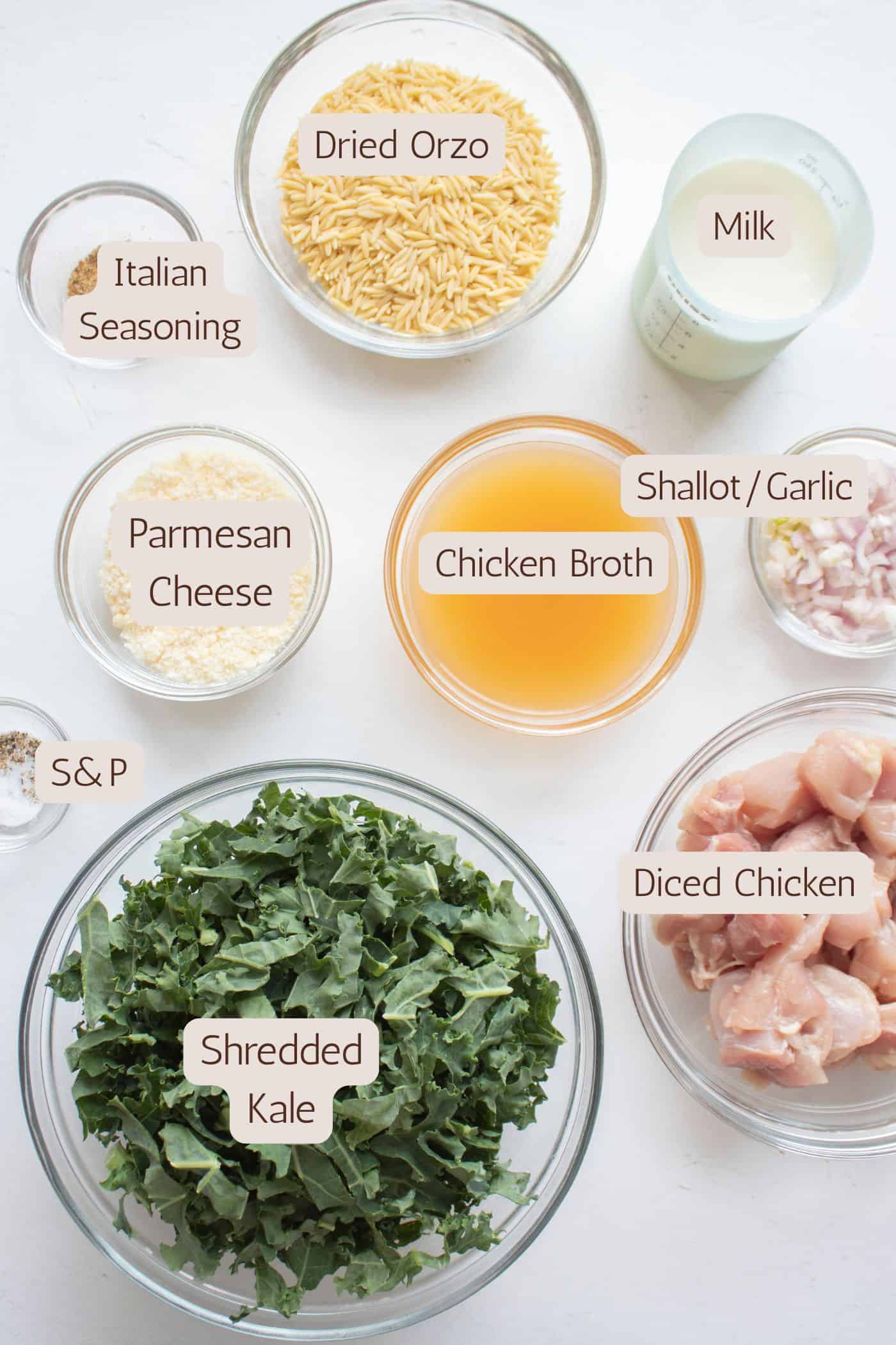 Ingredients to make a creamy orzo with chicken and kale skillet.