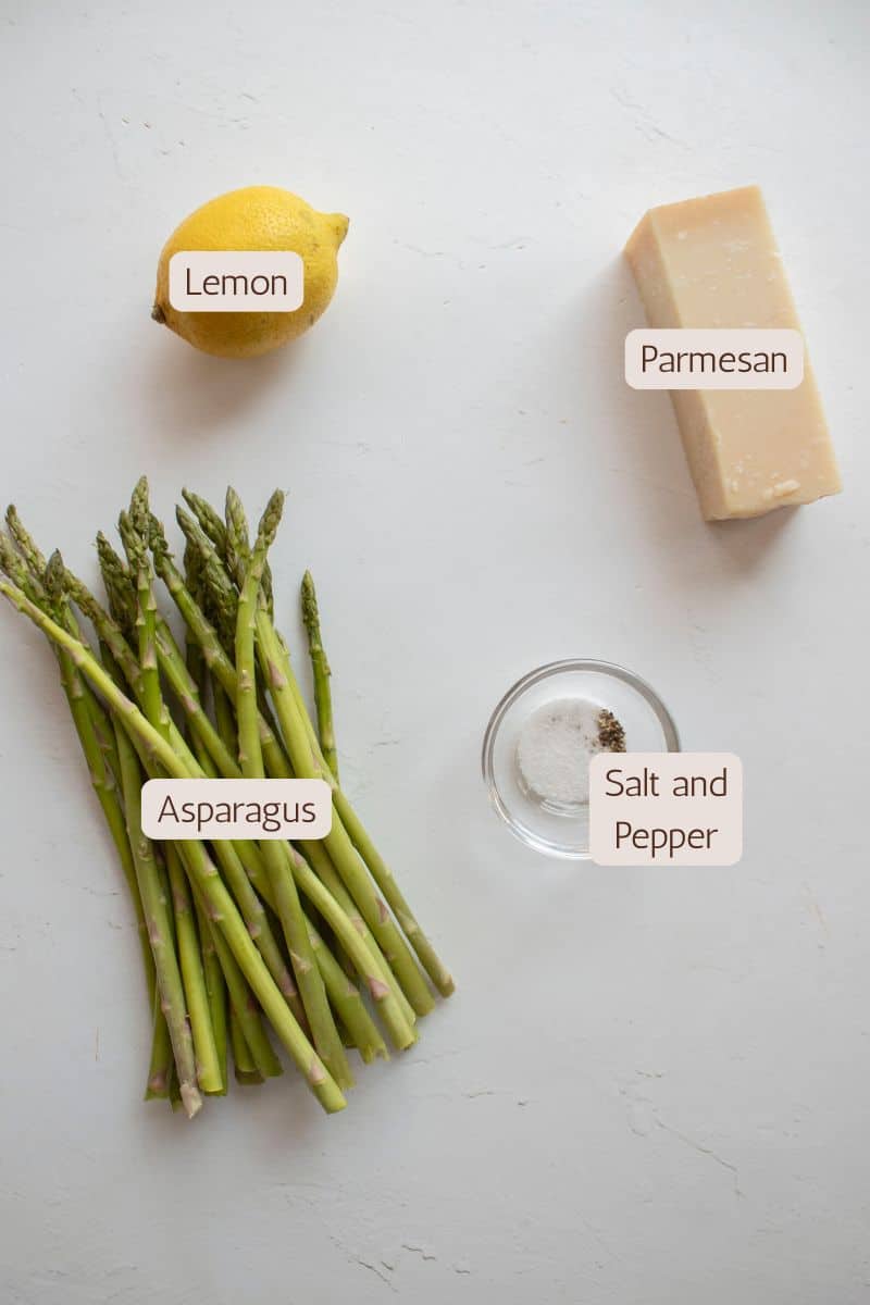 Ingredients to make air fryer asparagus with parmesan and lemon zest.