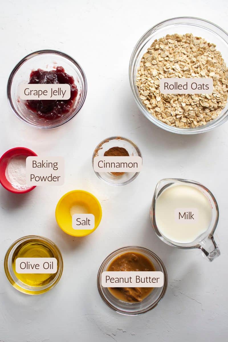 Ingredients to make a peanut butter and jelly oatmeal bake.