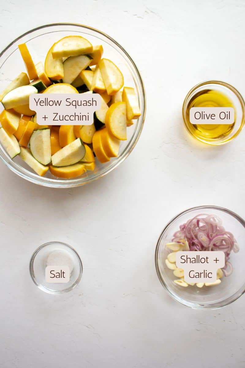 Ingredients to make sauteed zucchini squash and yellow squash with garlic and shallot.