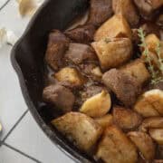 Cast iron garlic butter steak tips with air fried potatoes.